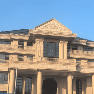 贵州黄金麻别墅外墙干挂石材效果示例