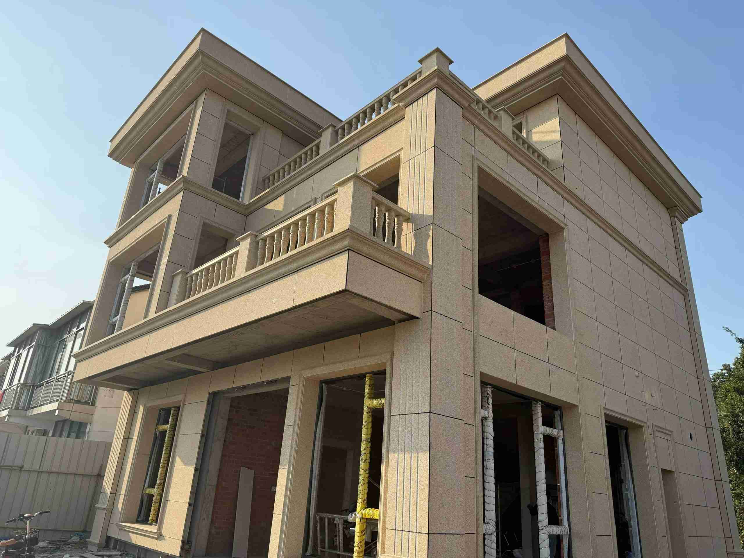 贵州 黄金麻花岗岩石材荔枝面外墙干挂效果展示