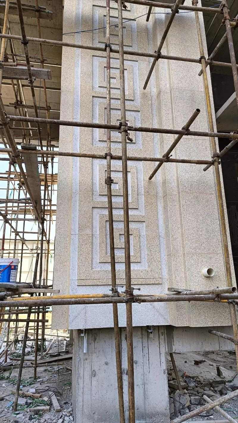 贵州 黄金麻花岗岩别墅外墙干挂回纹造型效果